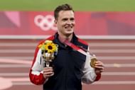 Karsten Warholm with his gold medal at the Tokyo 2020 Olympics (Photo by Jean Catuffe/Getty Images)